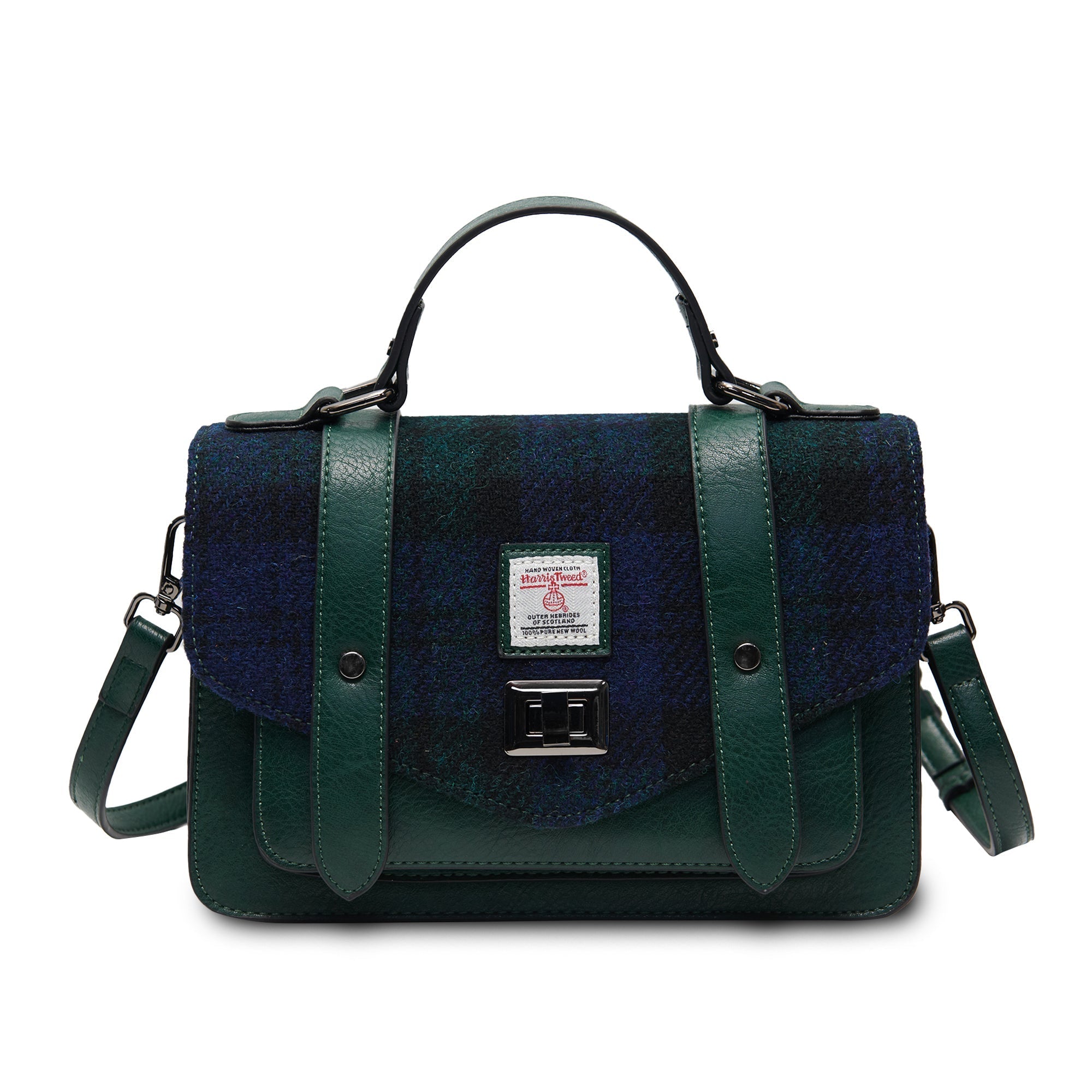 Green and blue patterned bags on a textured surface