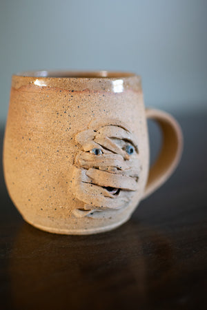 The Unravelling Mummy Pottery Mug