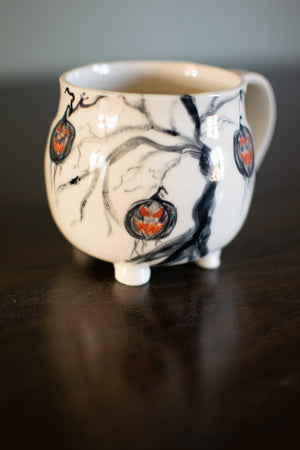 The Haunted Pumpkin Tree Pottery Mug